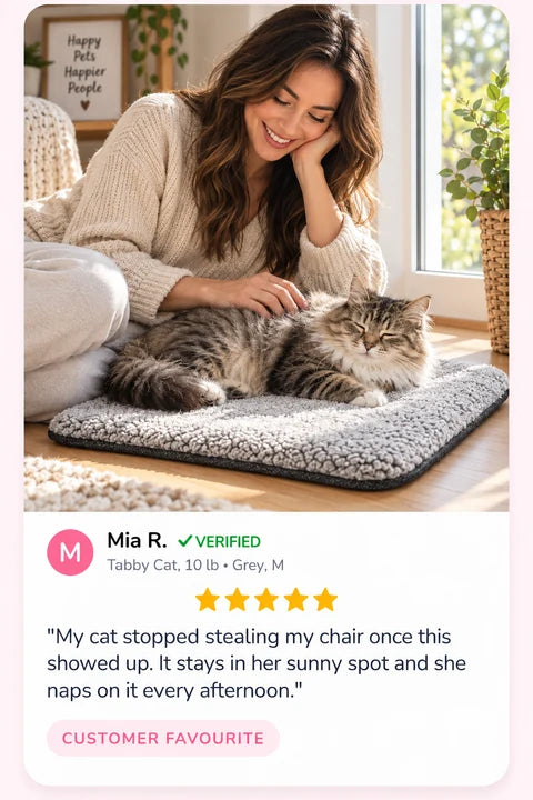 Review by Mia R.: My cat stopped stealing my chair once this showed up. It stays in her sunny spot and she naps on it every afternoon.